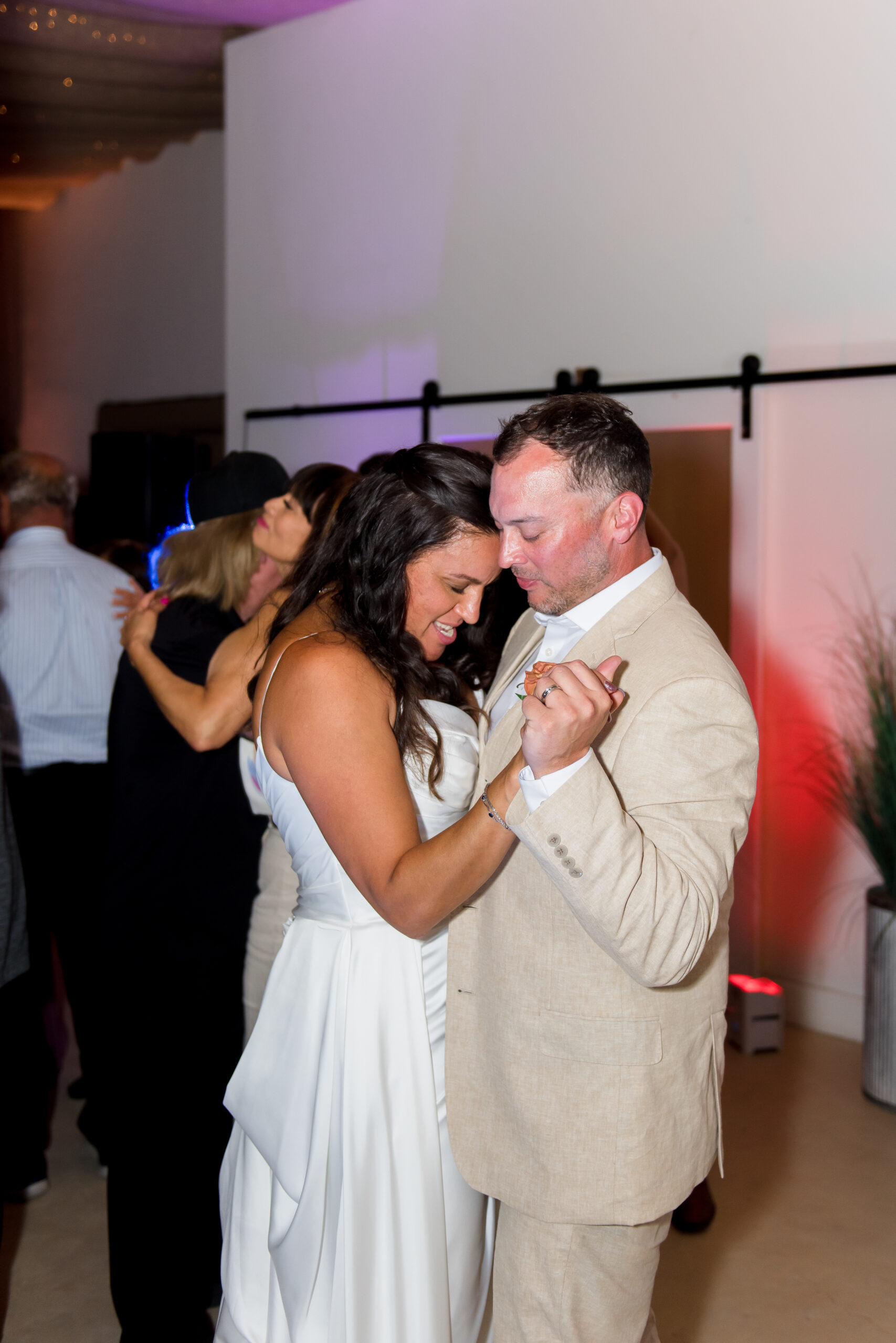 bride and groom dancing at their wedding