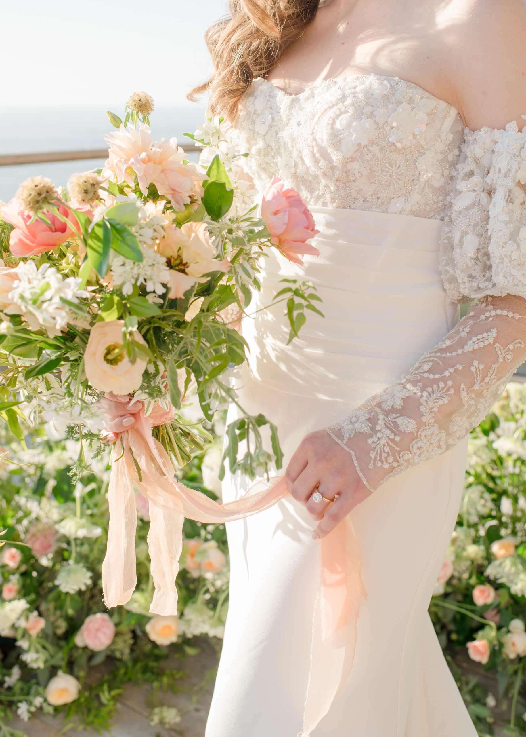 bride holding flower bouquet 