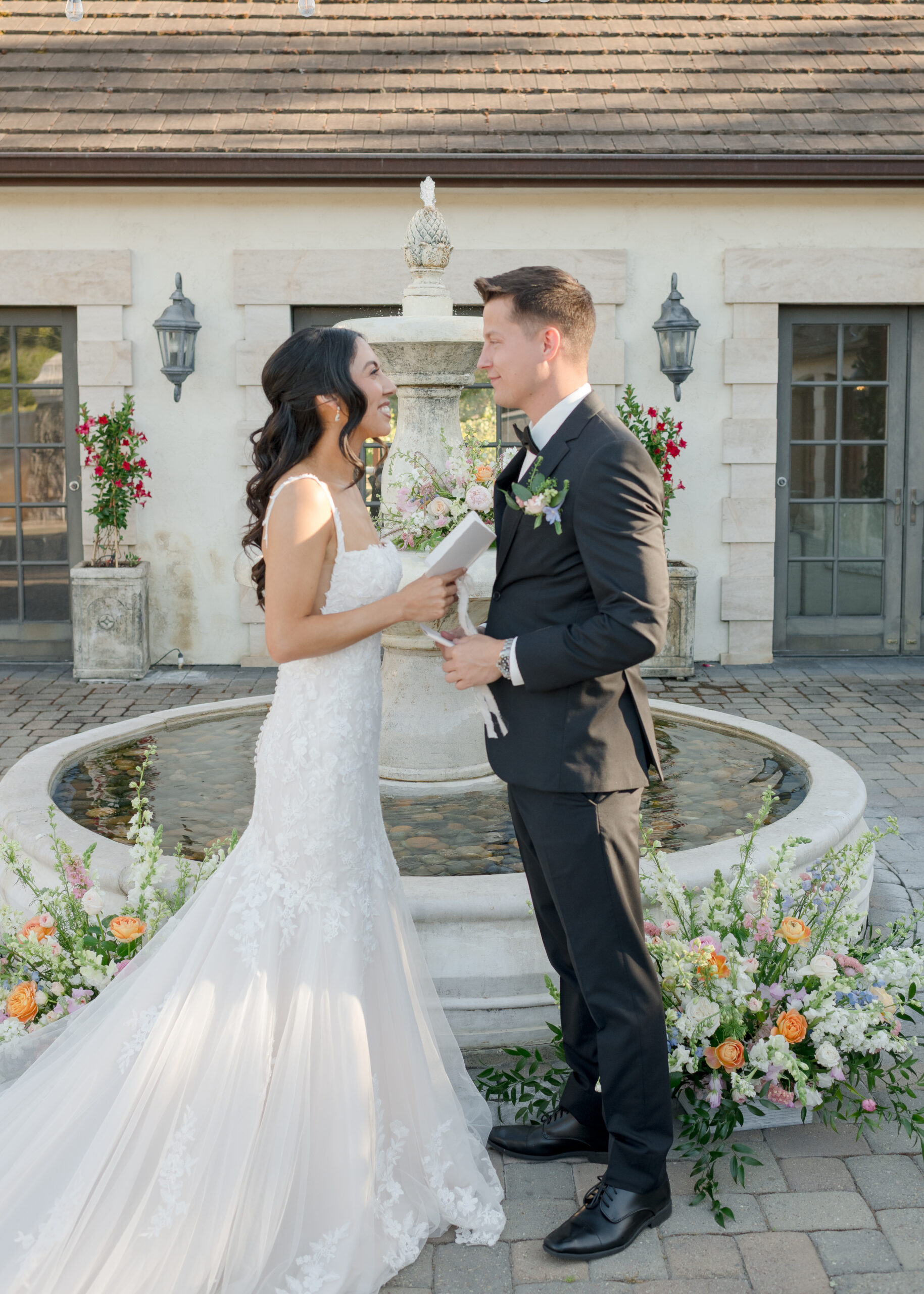 bride and groom reading vows at ceremony
