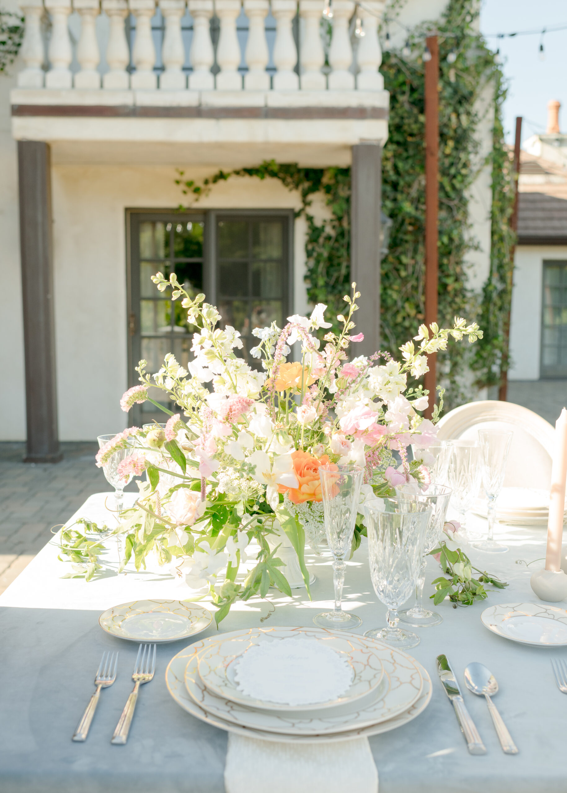 wedding reception table in front of vineyard