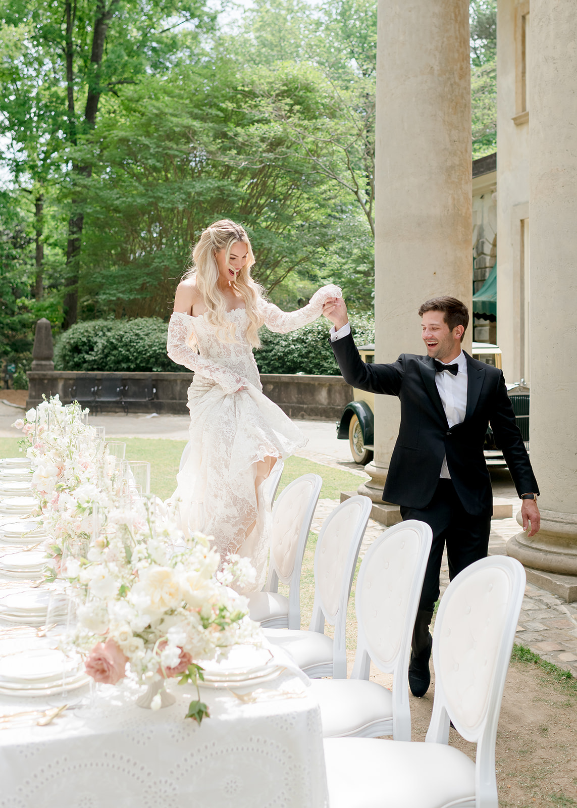 bride walking on chairs at wedding reception in atlanta 